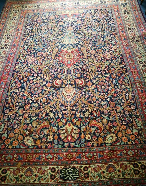 A Tabriz blue ground carpet, slight wear 340 x 270cm